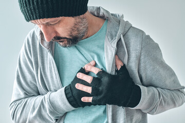 Man with heart problems feeling severe pain in chest