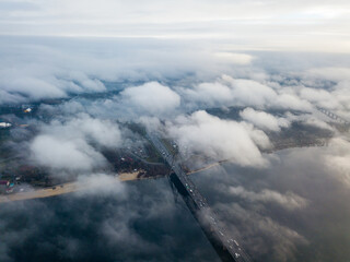 Obraz premium Aerial drone view. North bridge in Kiev, shrouded in morning fog.