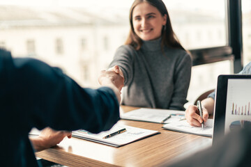 close up. employee making financial calculations on a laptop.