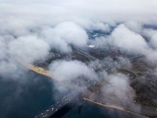 Aerial drone view. North bridge in Kiev, shrouded in morning fog.