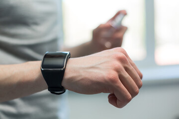 smart watch on the hand of a young man.