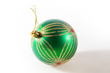 Green Christmas ball isolated on the white background