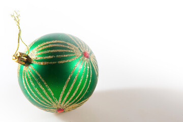 Green Christmas ball isolated on the white background