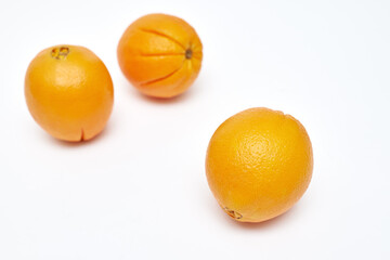 ripe oranges on a white background