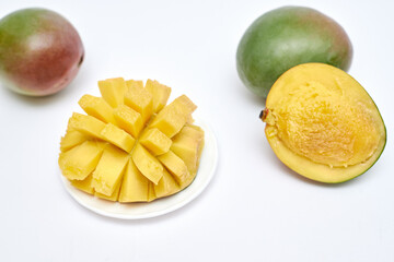 ripe mango sliced on white background