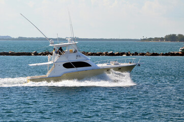 High-end sports fishing boat speeding on Government Cut in Miami,Florida