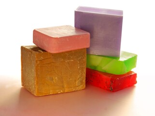 multicolor soaps ,washings gloves an cosmetics in bathroom