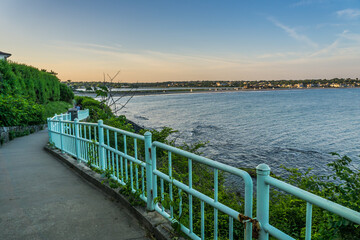 Cliff walk in Newport, RI, is a 3.5 mi path, following the shoreline, with great views of the ocean and the big Gilded Age mansions of Newport