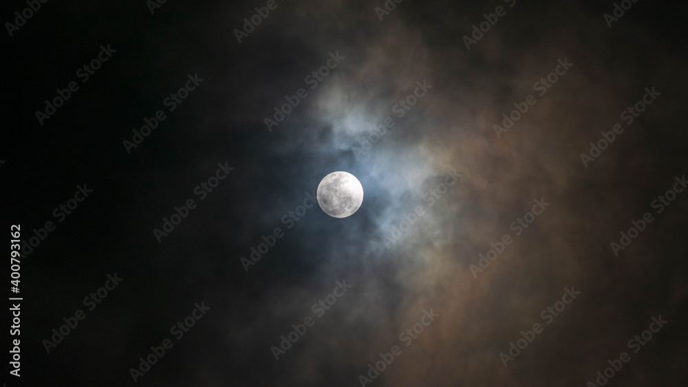 Wall mural full beaver moon and clouds