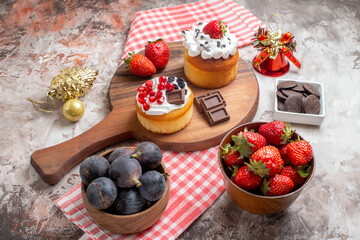 front view delicious cakes with fresh fruits on light background biscuit sweet cake dessert color