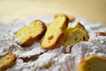 Some bread pieces on the flour. Making breakfast with fresh bread.