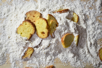 Some bread pieces on the flour. Making breakfast with fresh bread.
