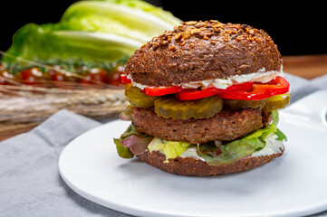 Grilled plant based, meat free vega burgers close up