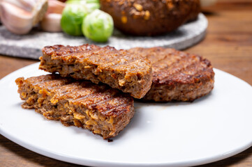 Grilled plant based, meat free vega burgers close up