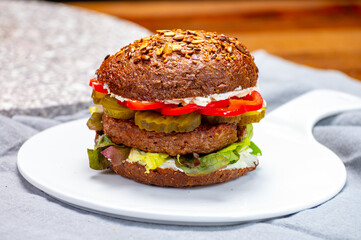 Grilled plant based, meat free vega burgers close up
