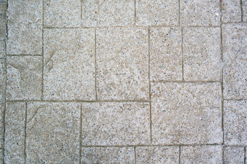 wall of rectangular stone bricks. background and texture of cobblestones. 