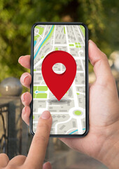 GPS App. Woman using smartphone with map and red pinpoint on screen