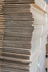 Pile of folded corrugated cardboard
