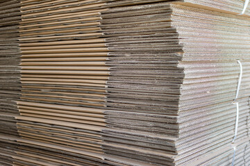 Pile of folded corrugated cardboard