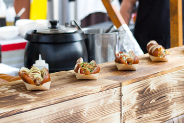 Hot dogs on a wooden street food stall 
