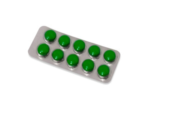 The packaging is a round, green pill, pills, pastilles. Isolated on white.