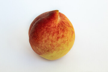 Delicious ripe peach on white background