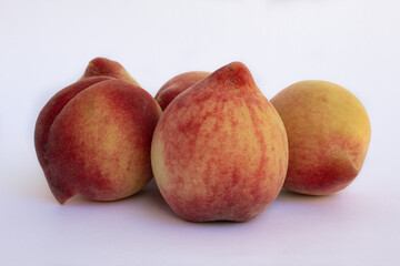 Beautiful peaches on white background