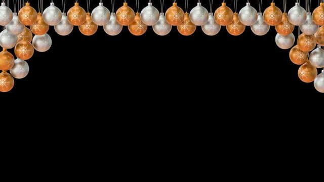 Swinging Christmas balls isolated on black background. Looping animated video frame.