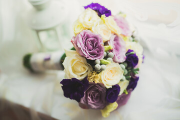 Beautiful wedding bouquet with different flowers, roses