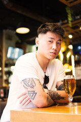 Portrait of a good looking chinese man.