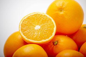 Orange fruit  isolated over white background. Whole and sliced orange. 
