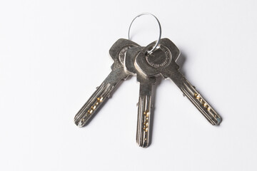 set of door keys on a white background. Safety concept,