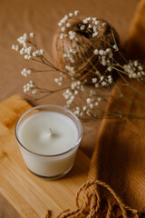 christmas candle on a table. Comfort in home.