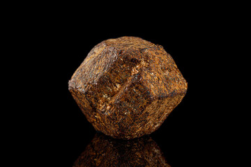 macro stone mineral garnet on a black background