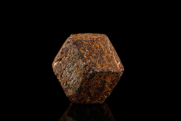 macro stone mineral garnet on a black background