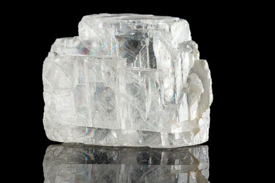 macro stone mineral Iceland spar on a black background