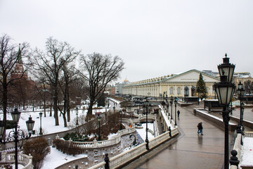 Fototapeta na wymiar view of Manezhnaya square and decorated Christmas tree on a cloudy winter day in Moscow Russia