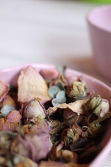 Dried flowers in clay bowls.