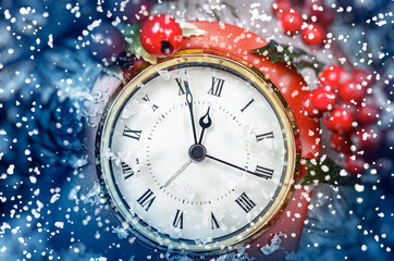 Fototapeta na wymiar New Year's clock and still life. The clock shows midnight.