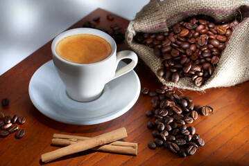Cup of Coffee coffee beans and Cinnamon