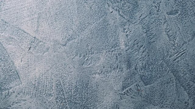 Background texture. decorative textured Venetian plaster beige. close-up