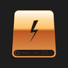 Gold Power bank icon isolated on black background. Portable charging device. Long shadow style. Vector.