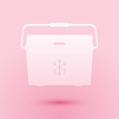 Paper cut Cooler bag icon isolated on pink background. Portable freezer bag. Handheld refrigerator. Paper art style. Vector.