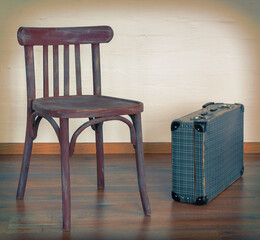 Old chair and an old suitcase - 400828796