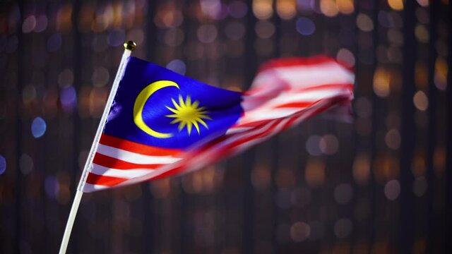 malaysia flay on light bokeh background