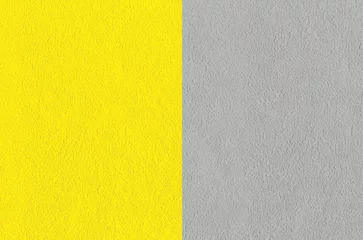 Farben des Jahres 2021 Leuchtendes Gelb und ultimatives Grau. hintergrund, stoffstruktur, dekorativer putz. trendige schönheit, mode, designkonzept. kopierraum, platz für text © Елена Якимова