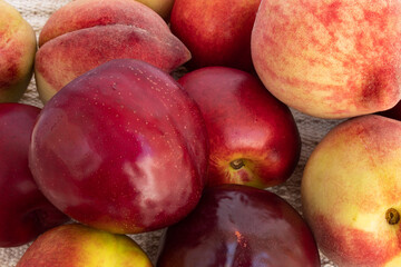 Background with close-up of tins, plums and nectarines