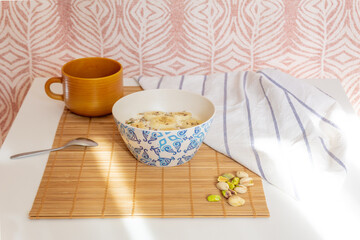 Healthy breakfast of a bowl with yogurt, seeds and fruits