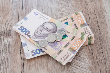 500 hryvnia on a wooden background. Ukrainian money.