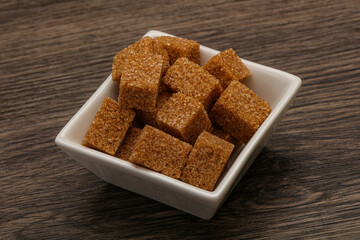 Cane sugar cubs in the bowl